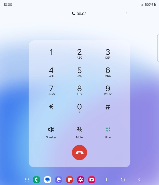 Press the end call icon.
