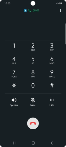 Press the end call icon.