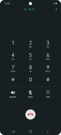 Press the end call icon.