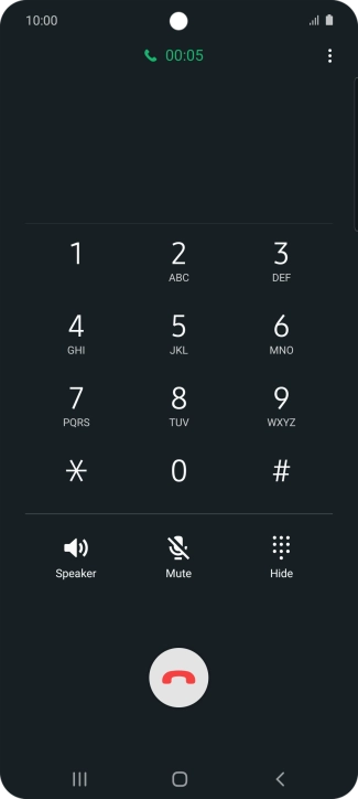 Press the end call icon.