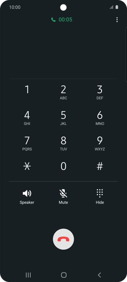 Press the end call icon.