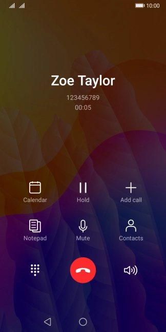 Press the end call icon.