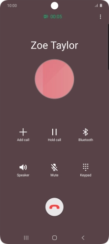 Press the end call icon.