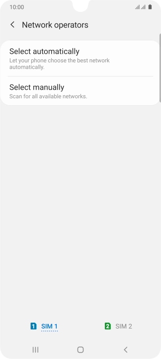 Press Select manually and your phone will search for networks.