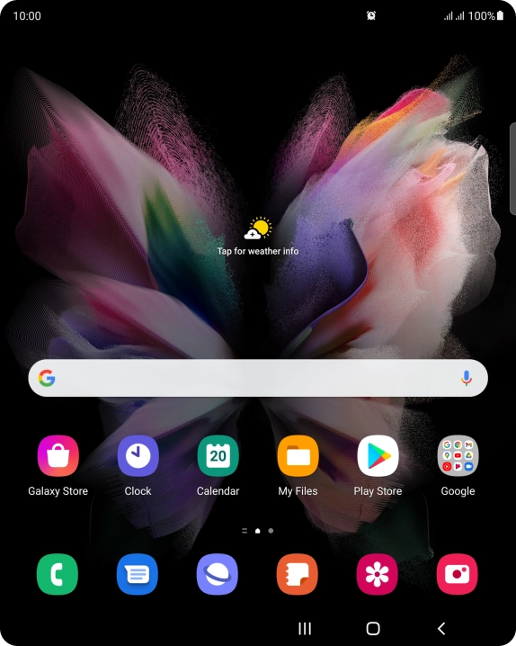The alarm icon shows that the alarm is set.