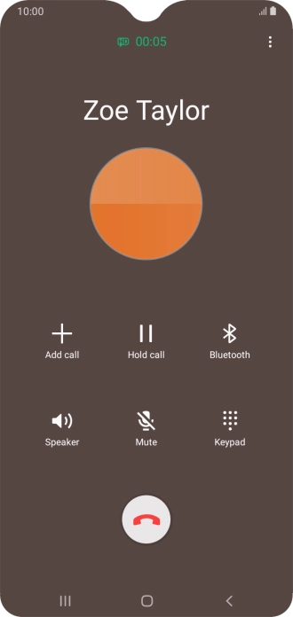 Press the end call icon.