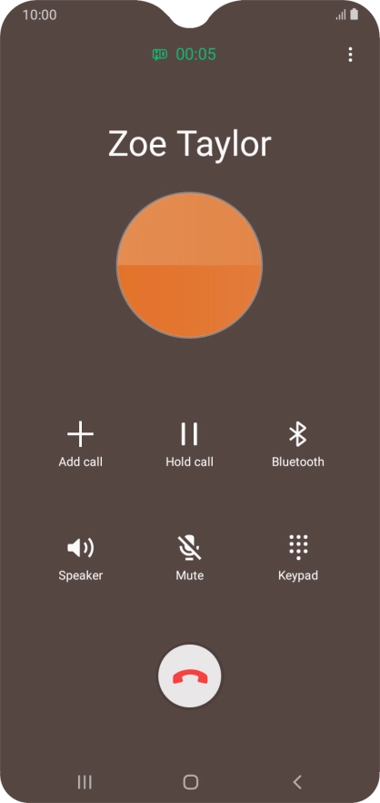 Press the end call icon.