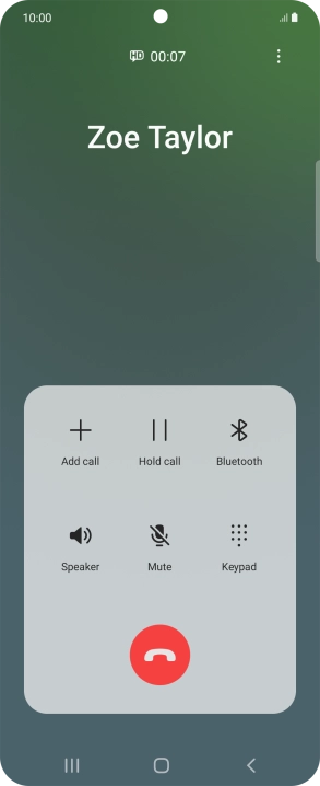 Press the end call icon.