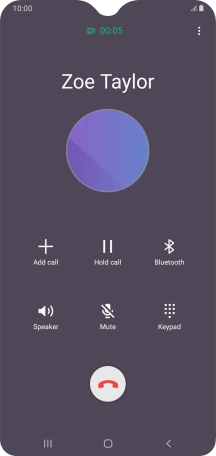 Press the end call icon.