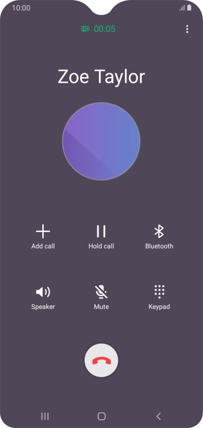 Press the end call icon.
