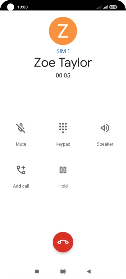 Press the end call icon.