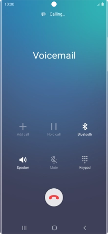 Press the end call icon.