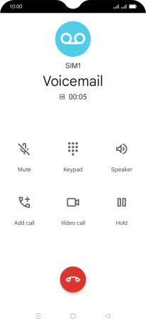 Press the end call icon.