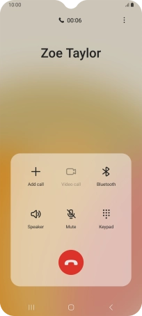 Press the end call icon.