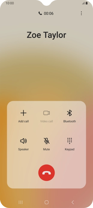Press the end call icon.