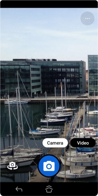 If the camera is turned on, press Video.