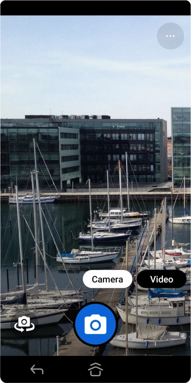 If the camera is turned on, press Video.