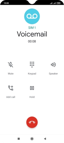 Press the end call icon.