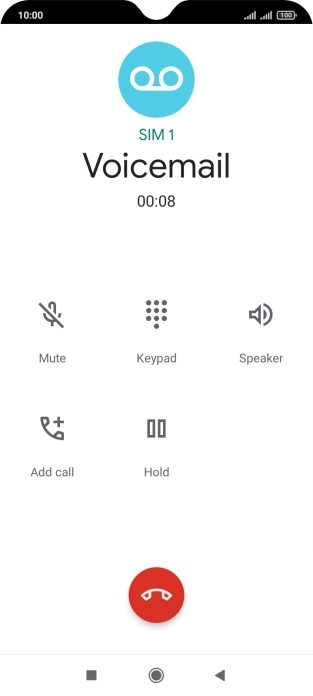 Press the end call icon.