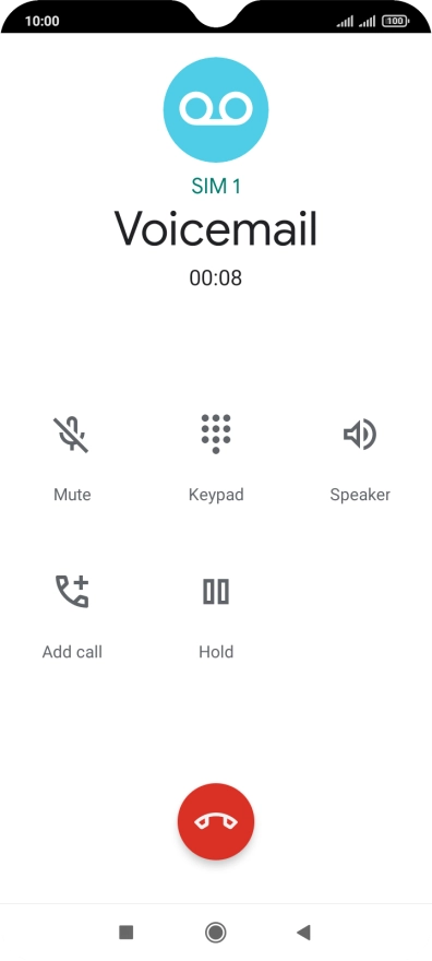 Press the end call icon.
