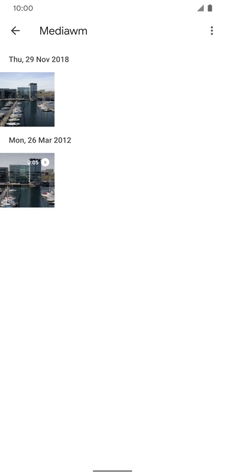 Go to the required folder and press the required picture or video clip.
