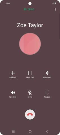 Press the end call icon.
