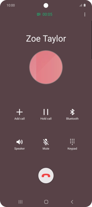 Press the end call icon.