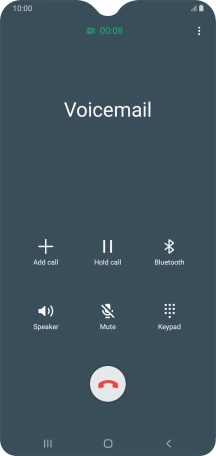 Press the end call icon.
