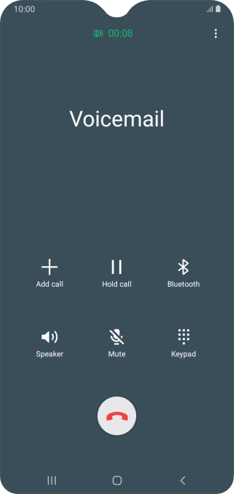 Press the end call icon.