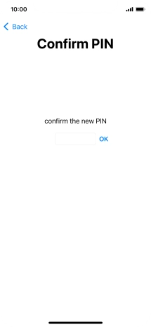 Key in the new PIN again and press OK.