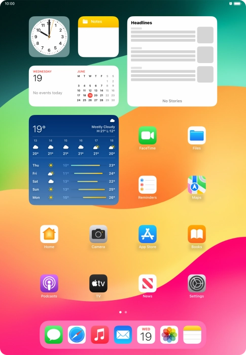 The alarm icon shows that the alarm is set.