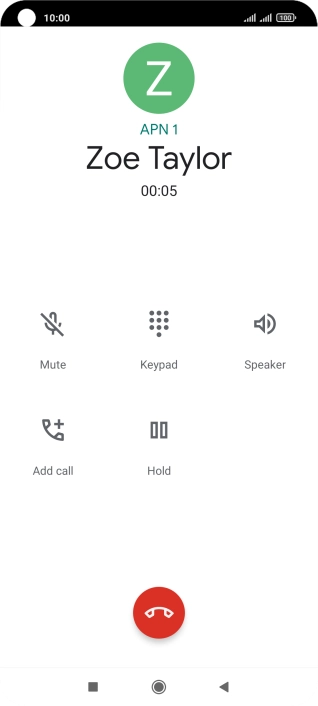 Press the end call icon.