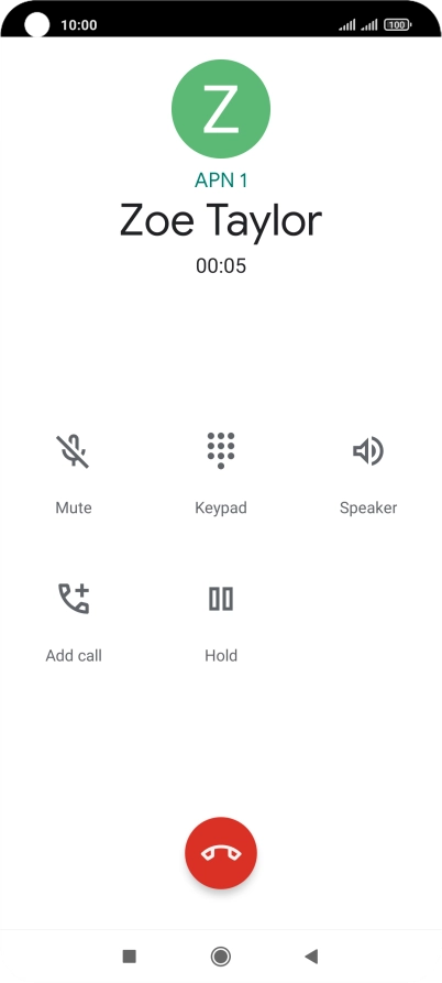 Press the end call icon.