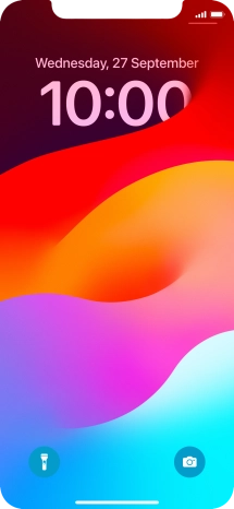 Press and hold anywhere on the lock screen.
