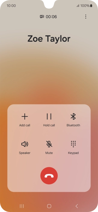 Press the end call icon.