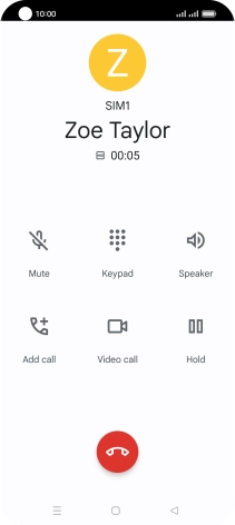 Press the end call icon.