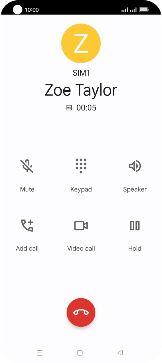 Press the end call icon.