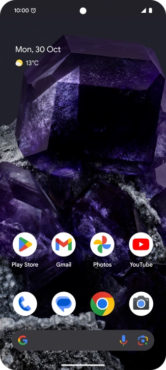 The alarm icon shows that the alarm is set.