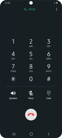 Press the end call icon.