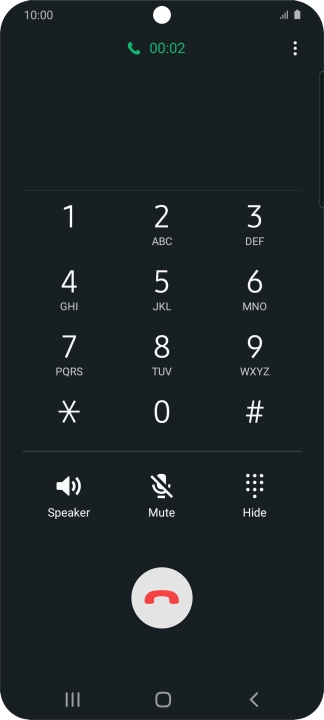 Press the end call icon.