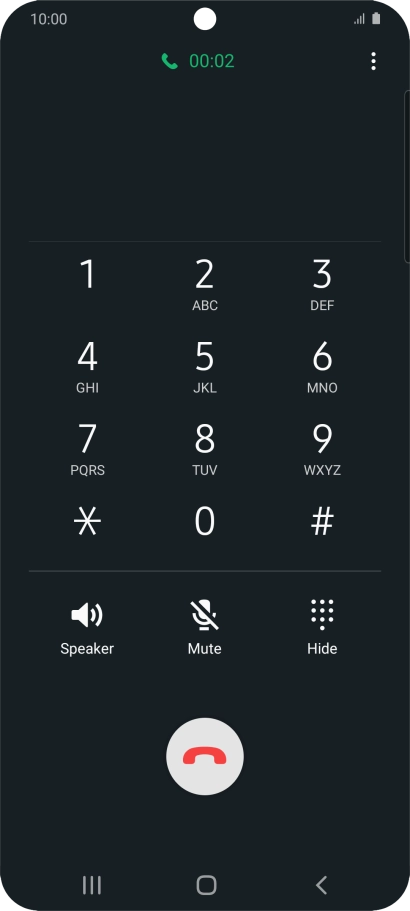 Press the end call icon.