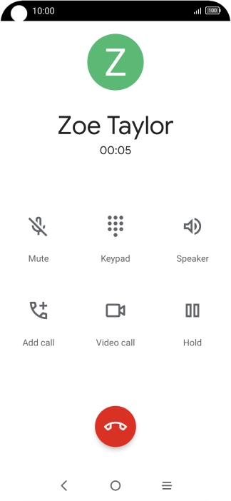 Press the end call icon.