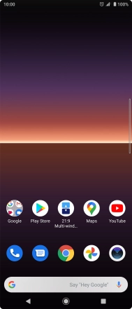 The alarm icon shows that the alarm is set.
