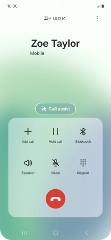 Press the end call icon.