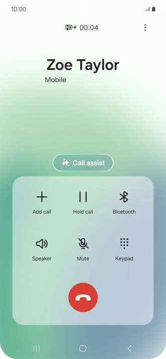Press the end call icon.