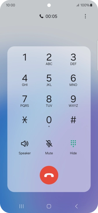 Press the end call icon.