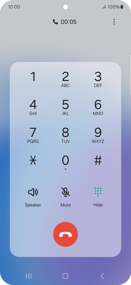 Press the end call icon.