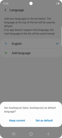 To select the new language as the default phone language, press Set as default.