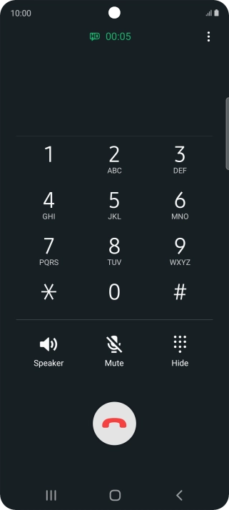 Press the end call icon.