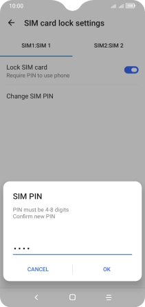 Key in the new PIN again and press OK.